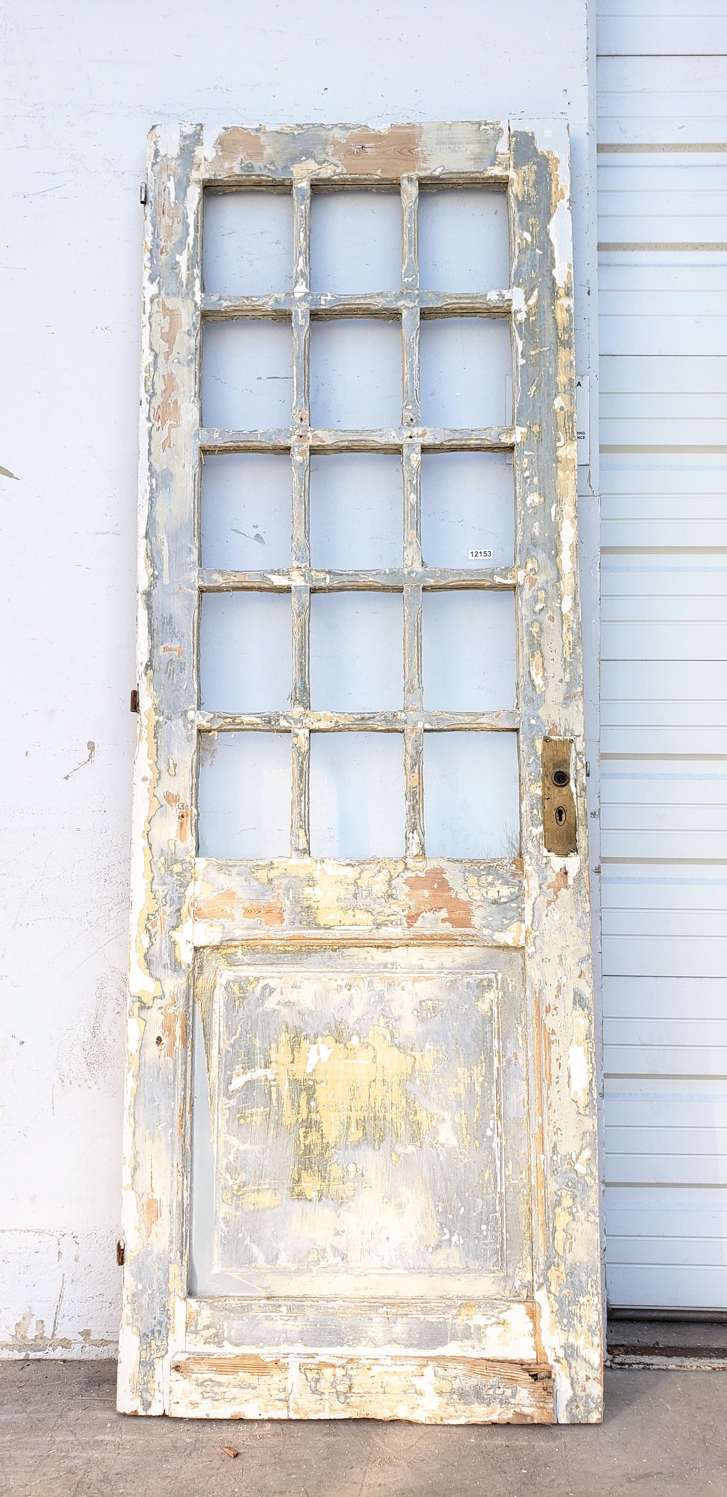Antique Paneled 15 Lite Glass Single Wood Door