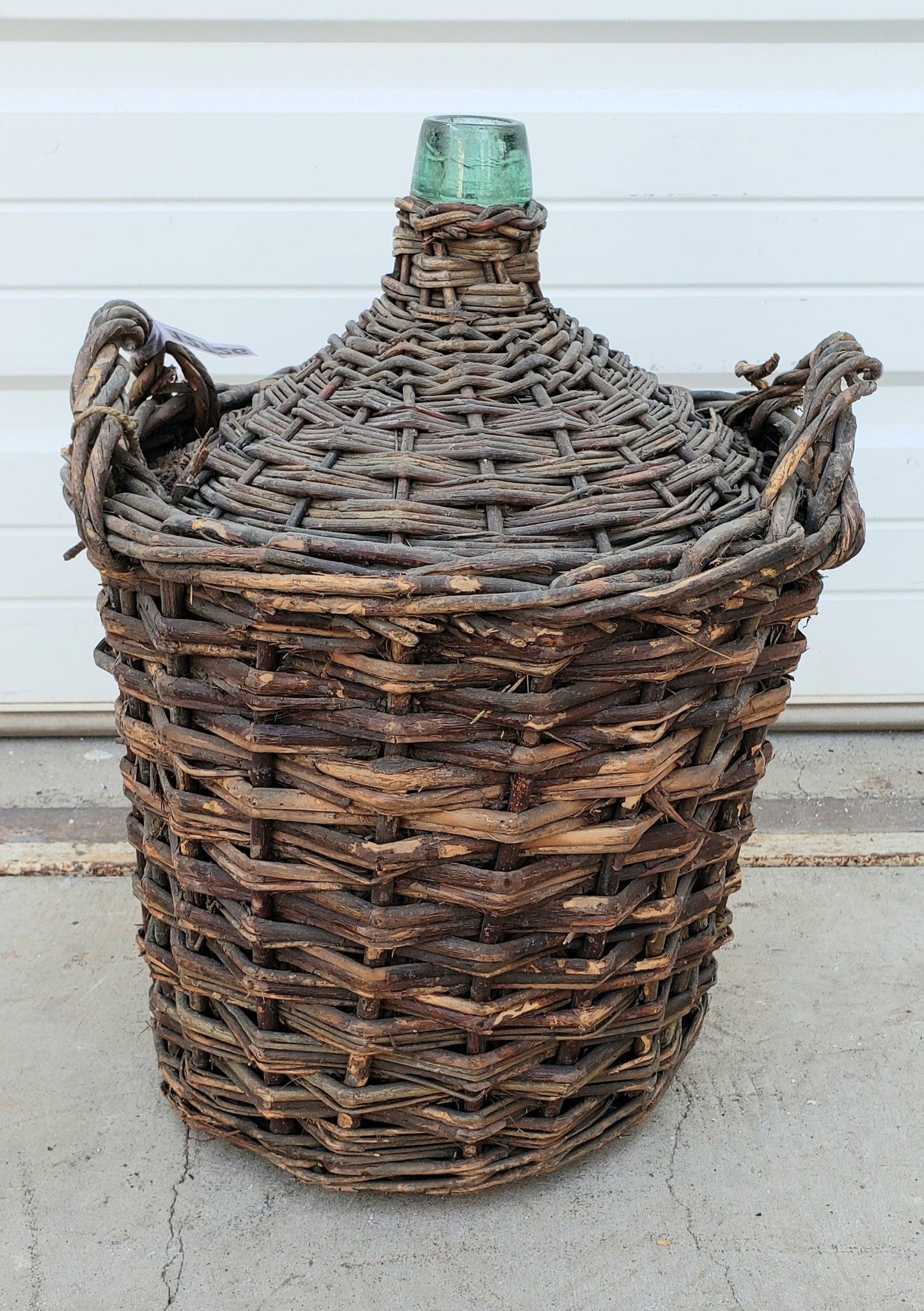 Antique Wine Bottle in Basket