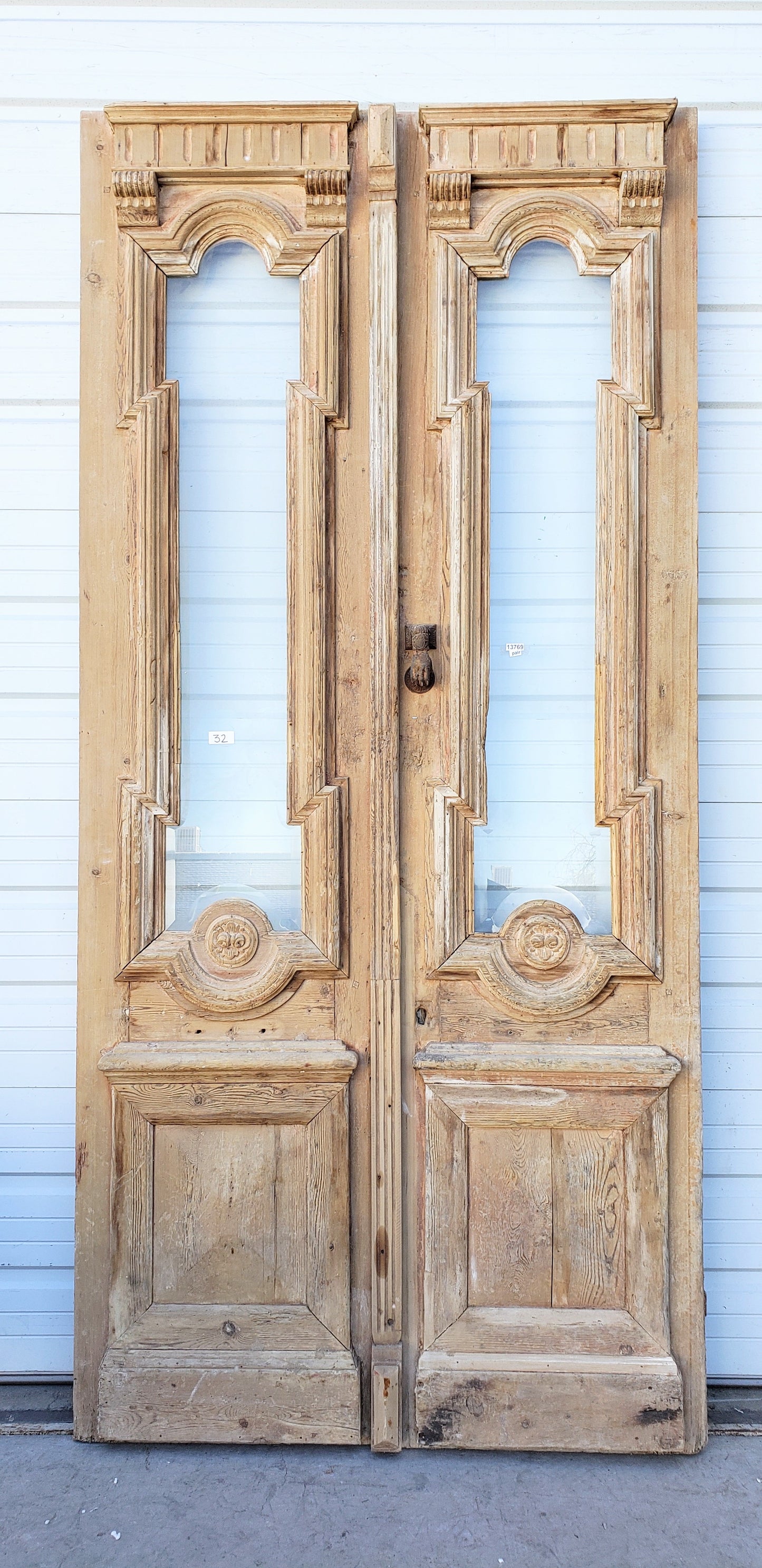 Pair of Antique Wood Carved Doors with Single Glass Lites