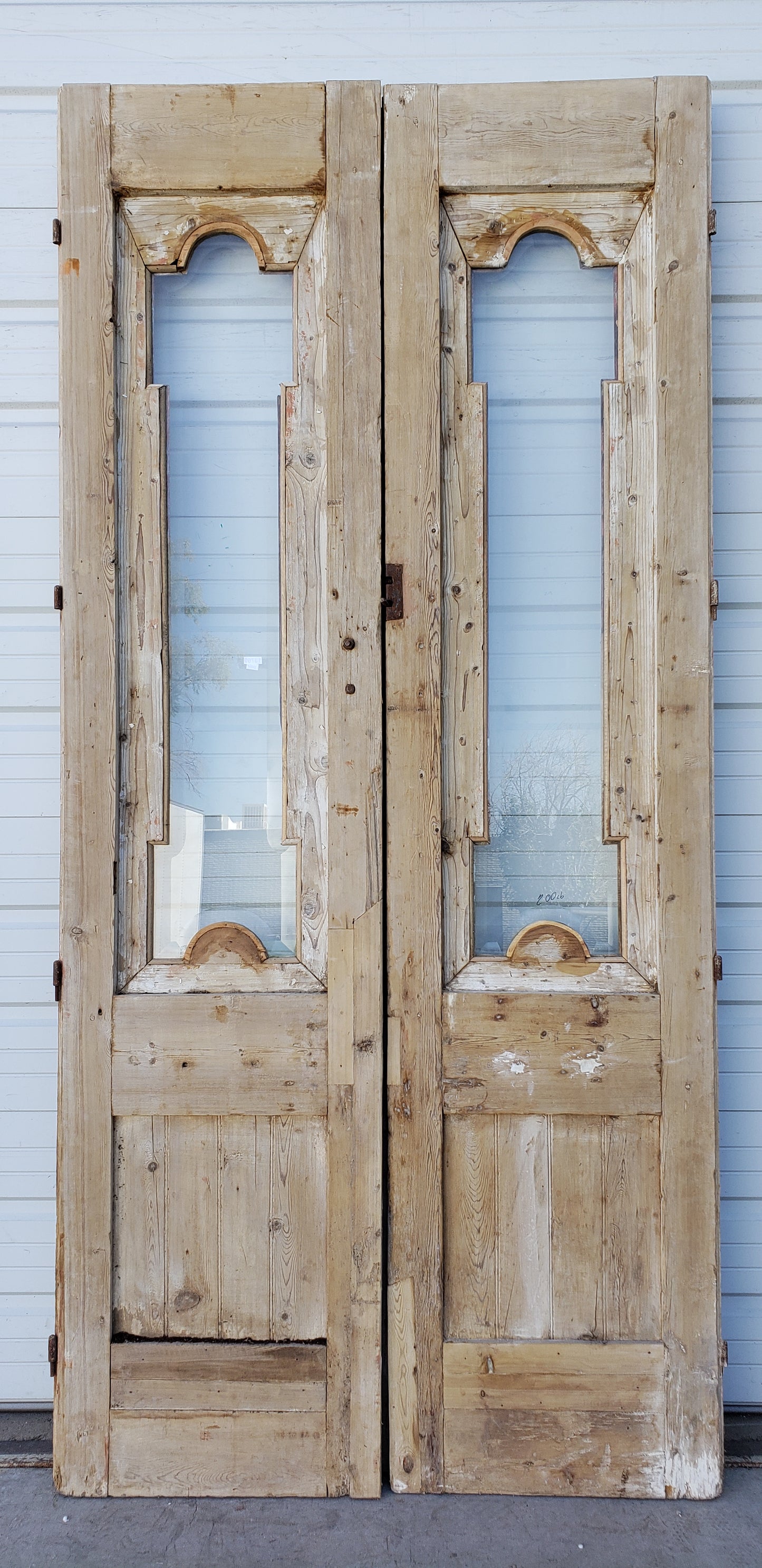Pair of Antique Wood Carved Doors with Single Glass Lites