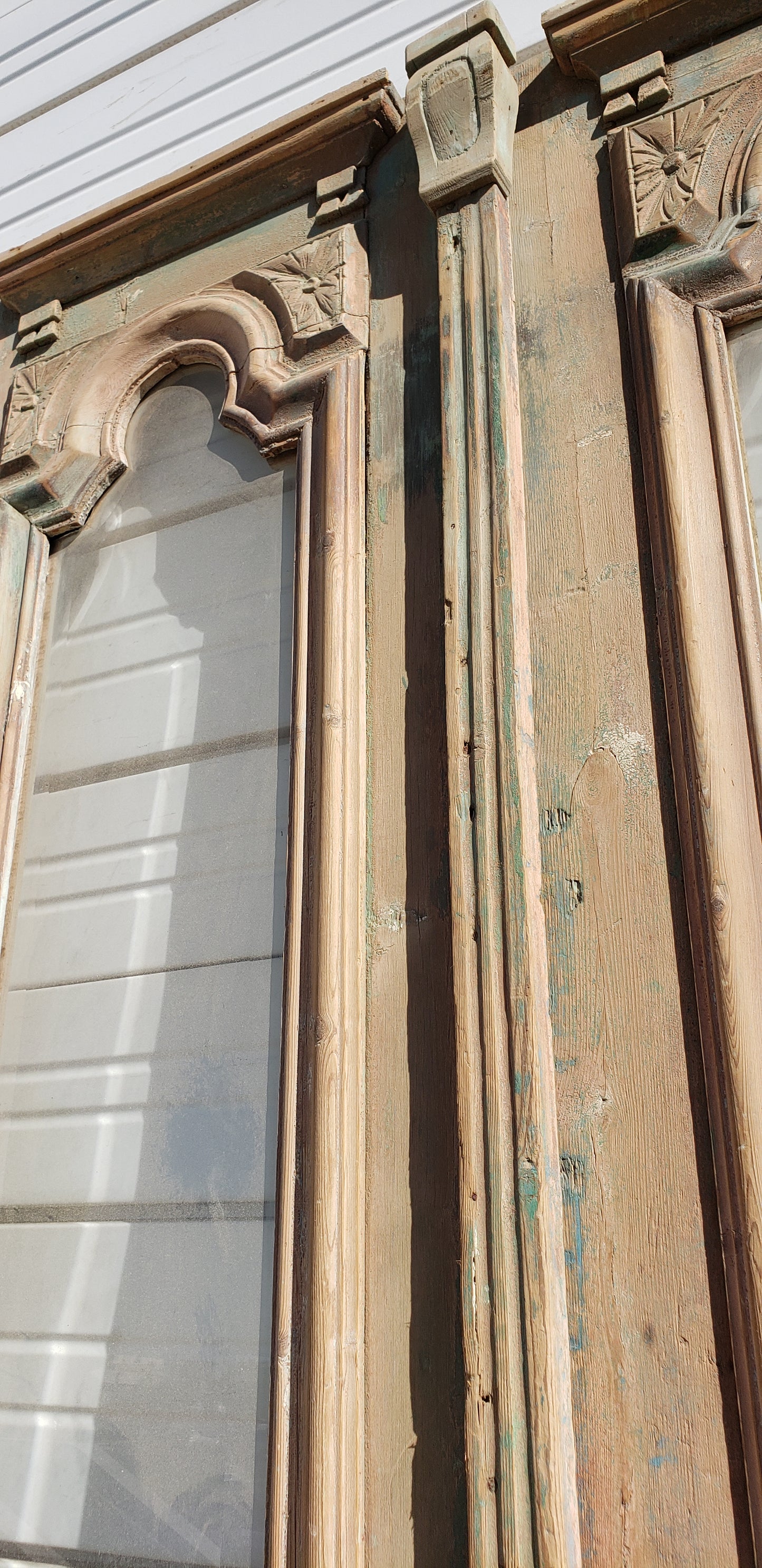 Pair of Antique Painted Single Lite Carved Doors