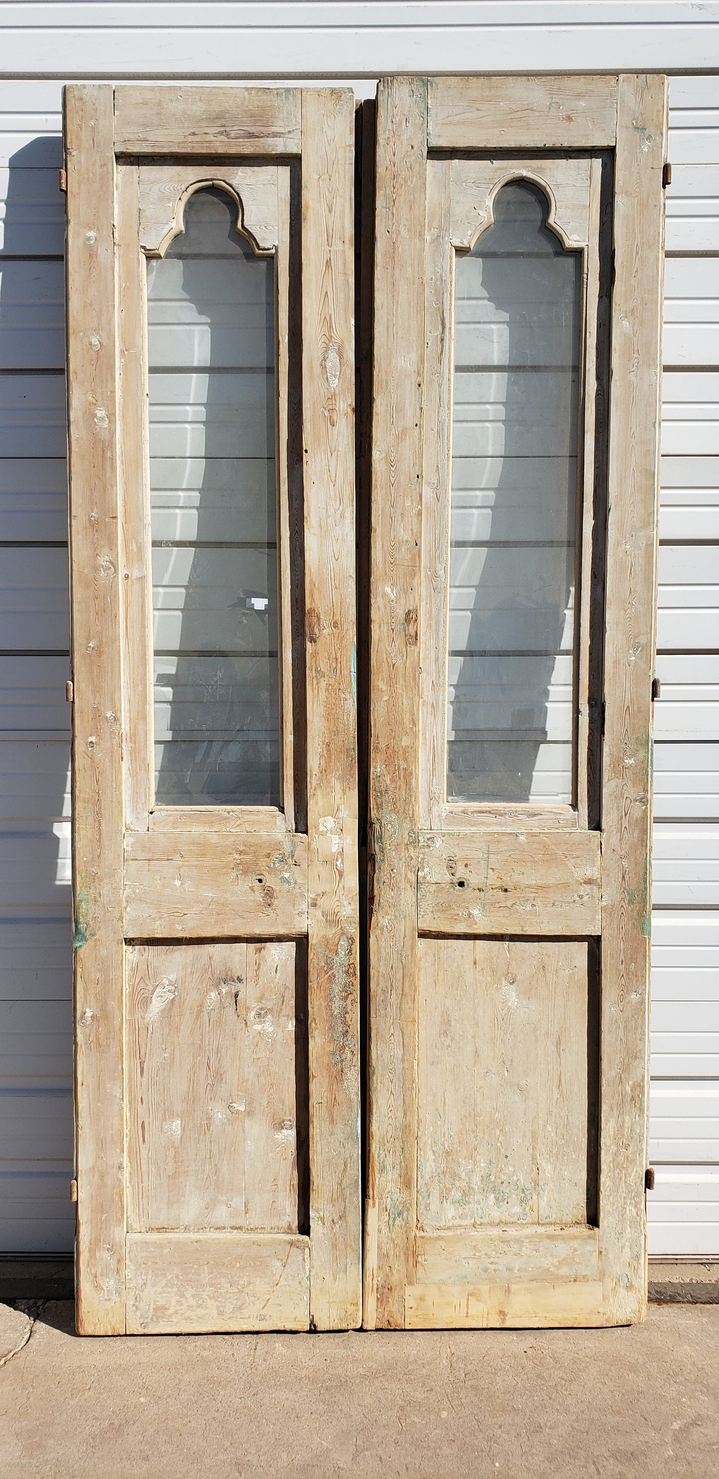 Pair of Antique Painted Single Lite Carved Doors