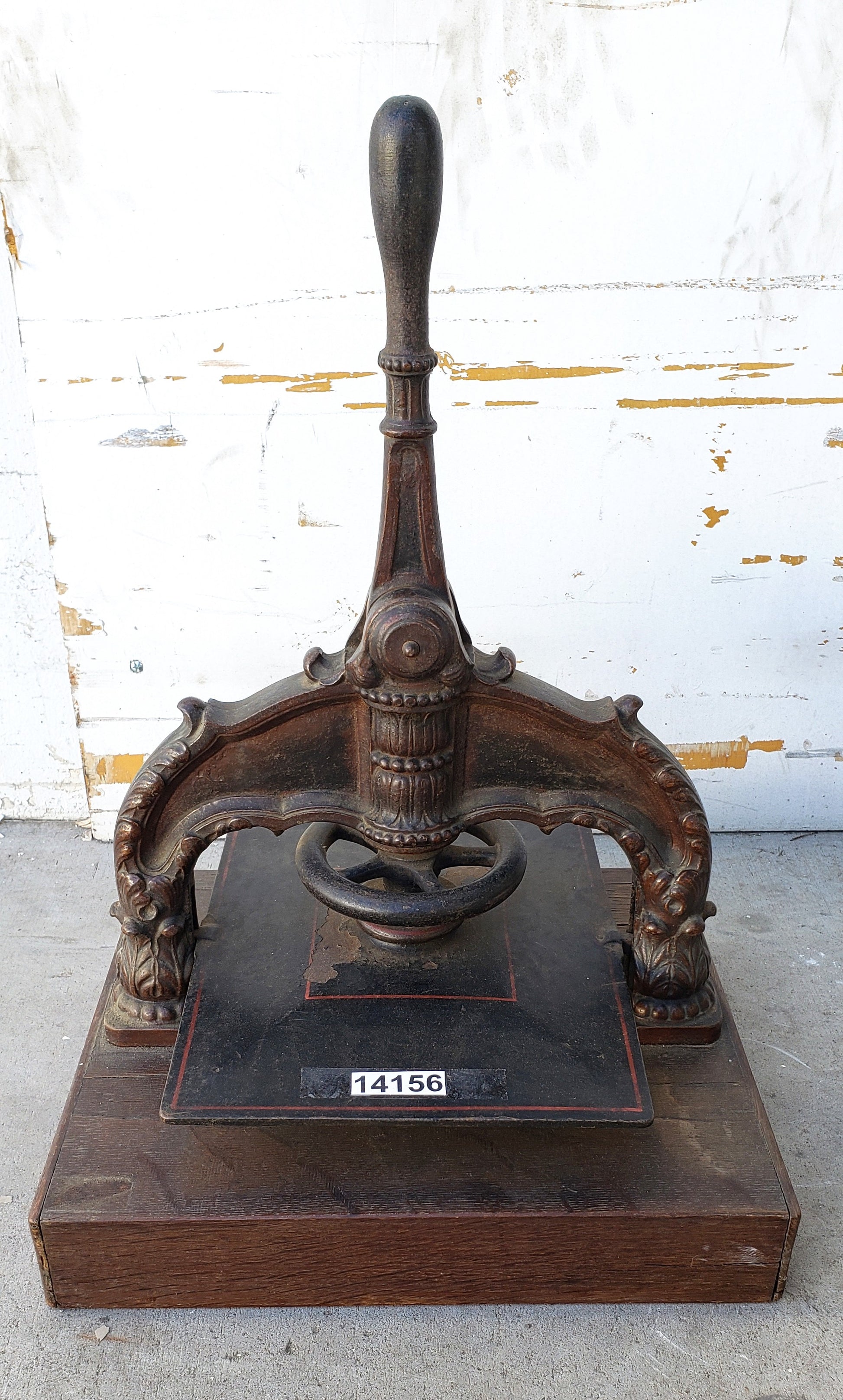 An antique cast iron book press, with brass maker's label to… - Antique &  Art Auction - Cordy's - Antiques Reporter