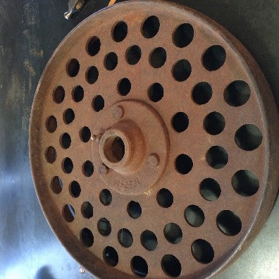 Wheel with many holes, iron 18" diam