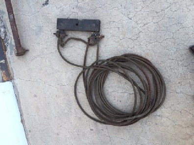 Elevator cable and wheels on rod