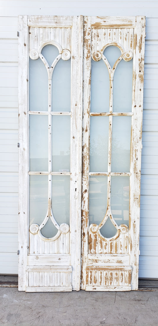 Pair of Ornate Paneled 8 Lite Washed Wood Doors