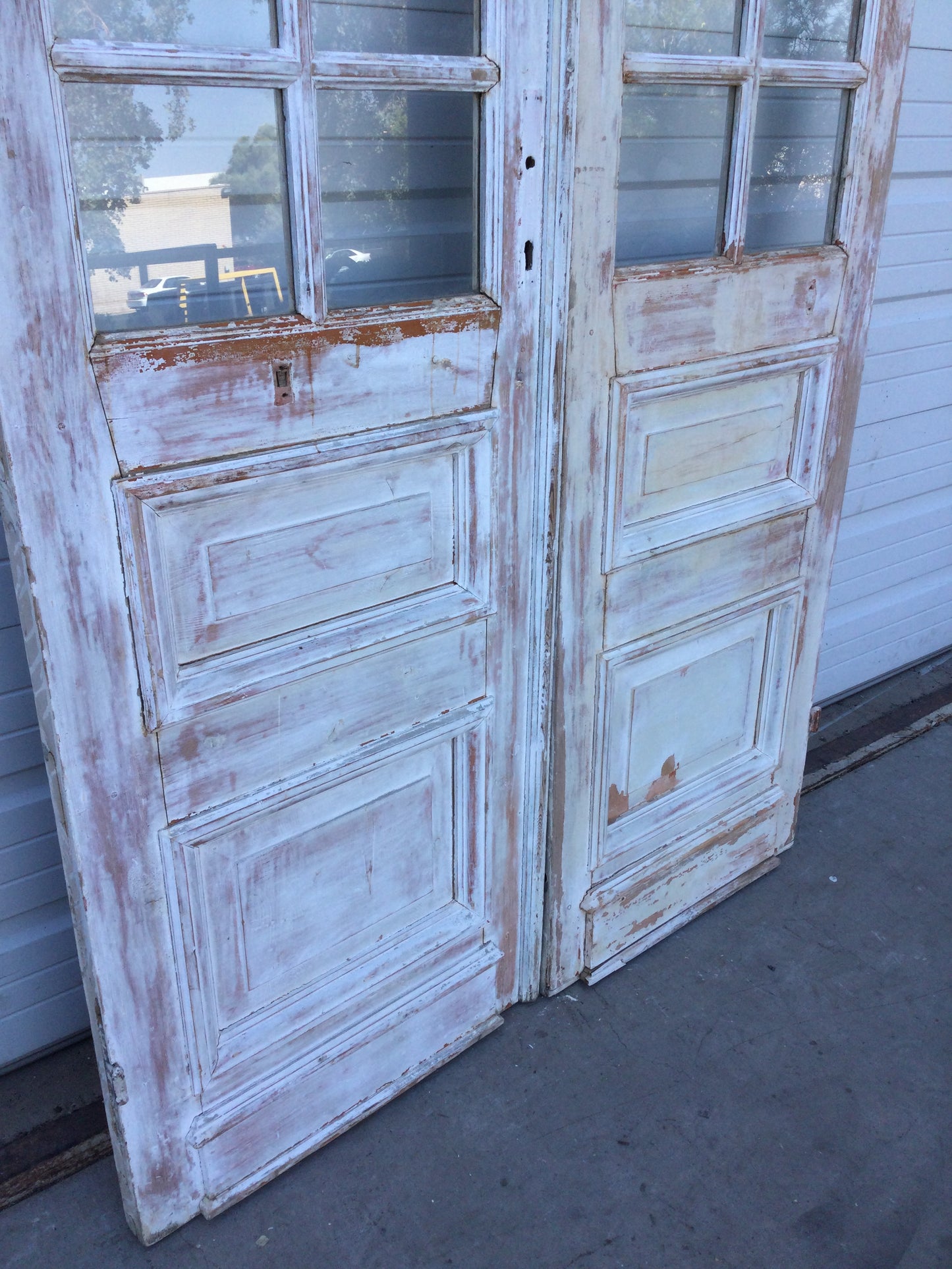 Pair of 2 Panel 7 Lite Washed Wood French Antique Doors