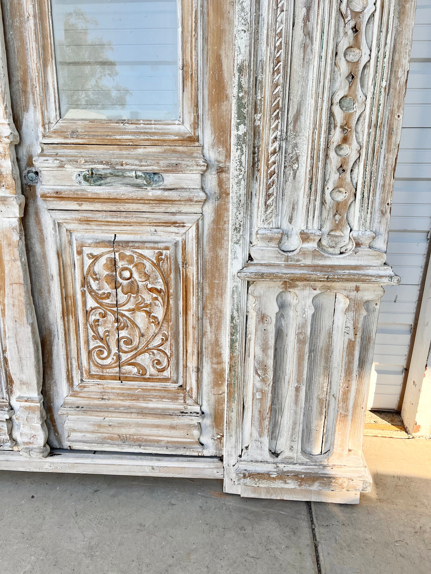 Pair of Ornately Carved Antique Doors in Large Frame with Transom