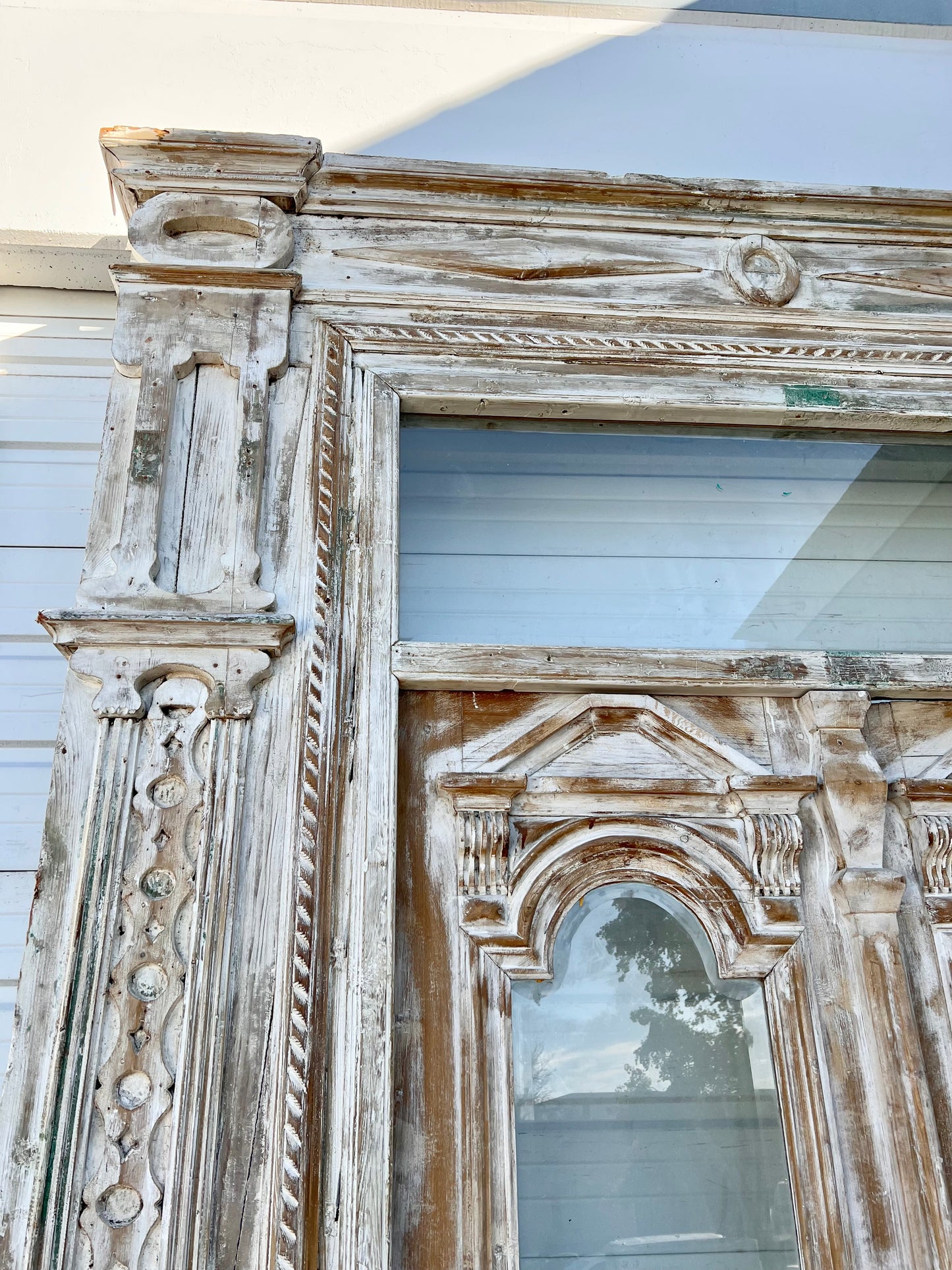 Pair of Ornately Carved Antique Doors in Large Frame with Transom