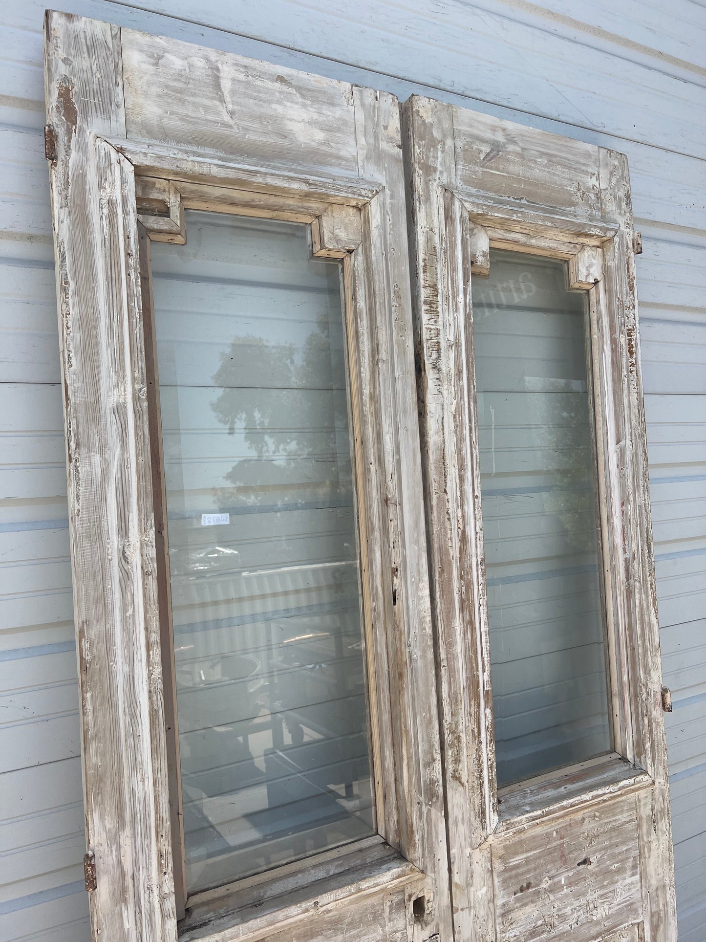 Pair of Bleached Antique Wood Carved One-Lite Doors
